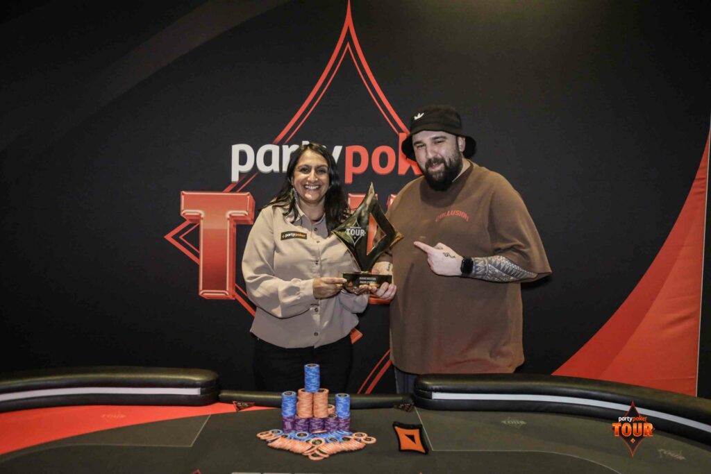 Raji handing over the coveted PartyPoker trophy to Deniz Orhan, winner of the 2025 PartyPoker Tour Manchester Main Event. Photo: PartyPoker
