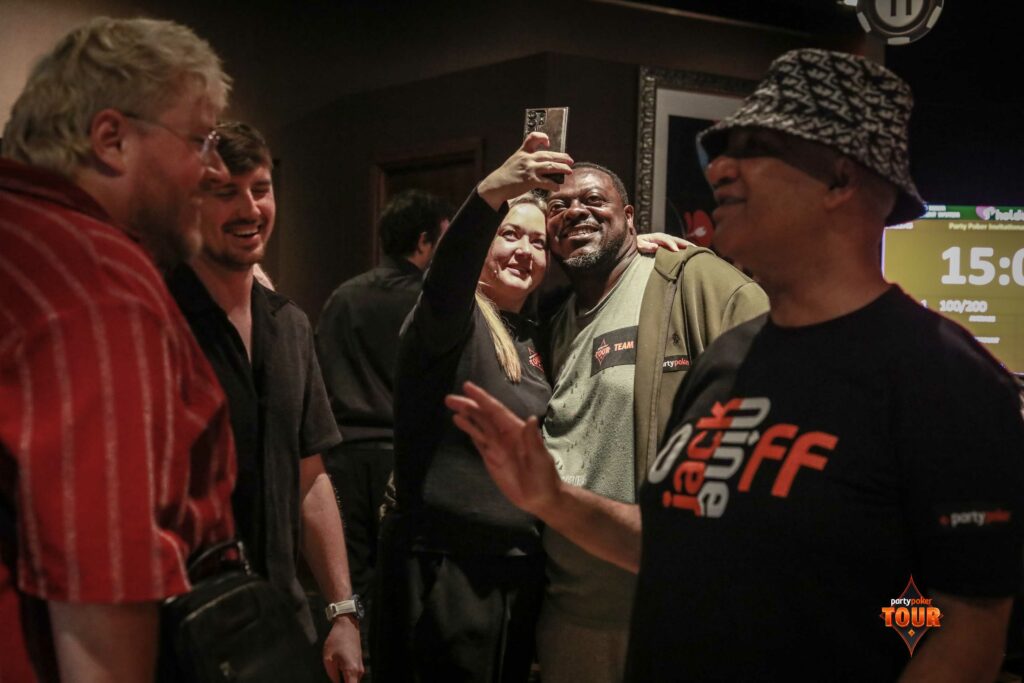 PartyPoker ambassadors greeting each other during the 2025 PartyPoker Tour Manchester. Photo: PartyPoker